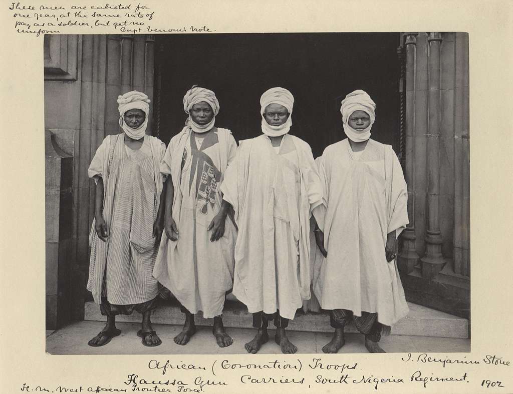 Four Hausa Gun Carriers of the South Nigerian Regiment, by Sir (John) Benjamin Stone (died 1914) - © The National Portrait Gallery, London