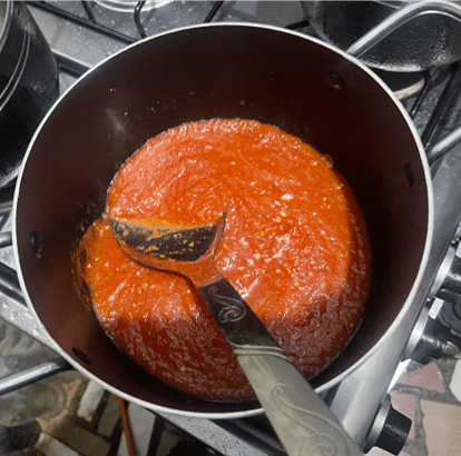 Cuisson de la sauce du Dakouin © Visiter le Bénin